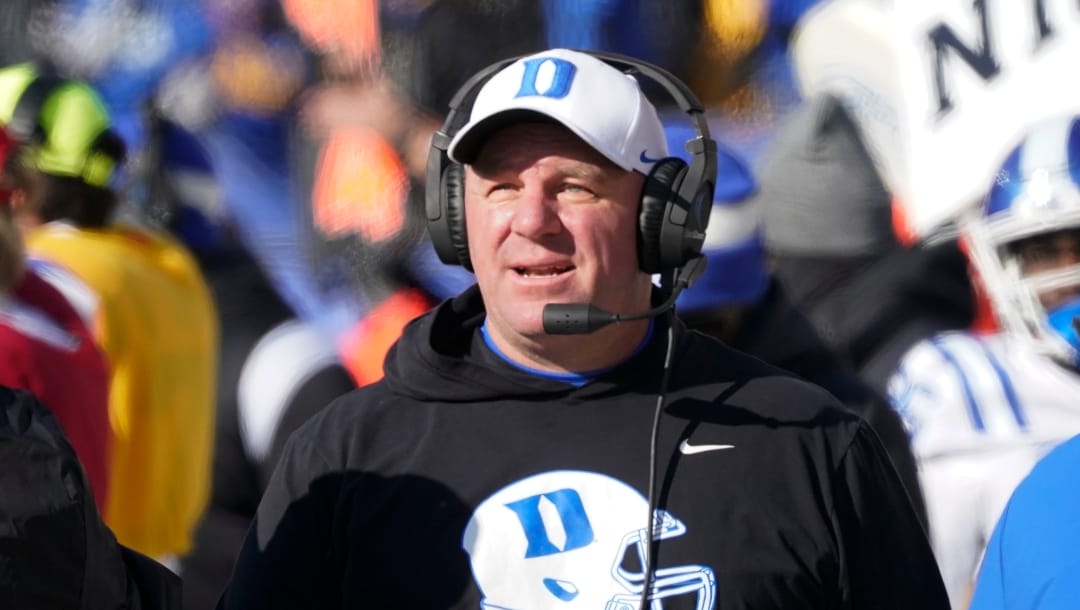 Duke head coach Mike Elko paces the sideline against Pittsburgh during the first half of an NCAA college football game, Saturday, Nov. 19, 2022, in Pittsburgh. (AP Photo/Keith Srakocic)