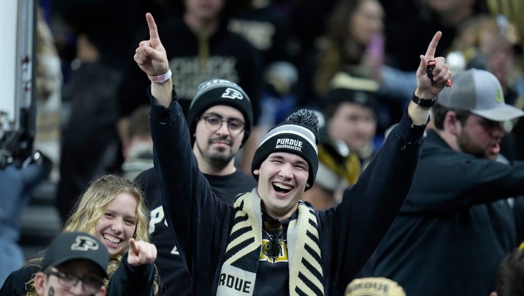 A Purdue fan is seen before the start of the Big Ten championship NCAA college football game against Michigan, Saturday, Dec. 3, 2022, in Indianapolis. (AP Photo/Michael Conroy)