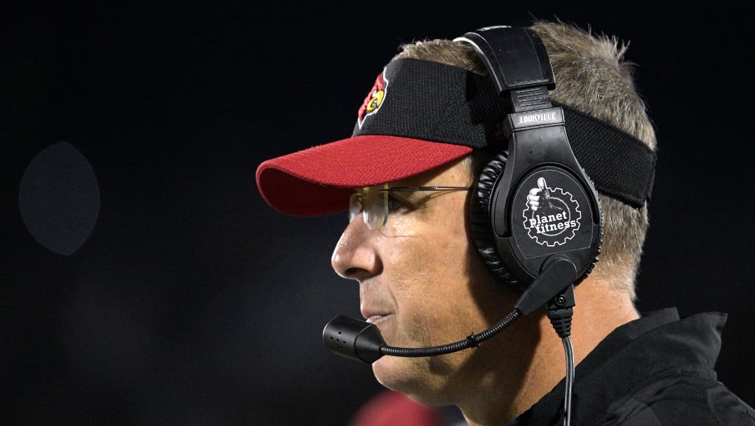Louisville head coach Scott Satterfield watches from the sideline during the first half of an NCAA college football game against Central Florida on Friday, Sept. 9, 2022, in Orlando, Fla. (AP Photo/Phelan M. Ebenhack)