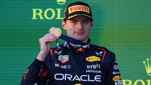 Red Bull driver Max Verstappen of Netherlands holds up a medal while on the podium after wining the Australian Formula One Grand Prix at Albert Park in Melbourne, Sunday, April 2, 2023. (AP Photo/Asanka Brendon Ratnayake)