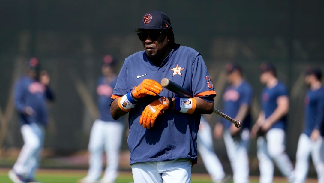 Houston Astros manager Dusty Baker watches his team during spring training baseball practice Tuesday, Feb. 21, 2023, in West Palm Beach, Fla. (AP Photo/Jeff Roberson)