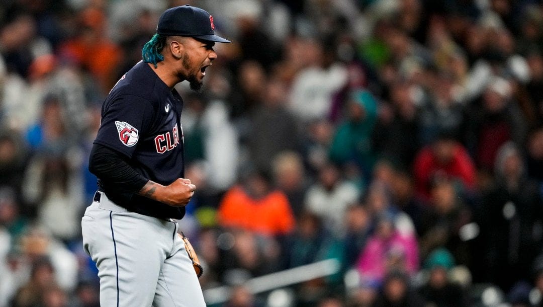 Cleveland Guardians relief pitcher Emmanuel Clase reacts after striking out Seattle Mariners' Eugenio Suarez to end the baseball game Saturday, April 1, 2023, in Seattle.