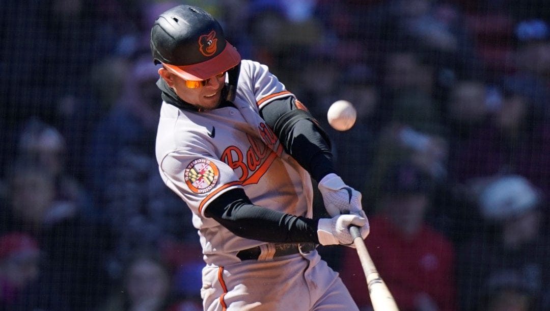 Baltimore Orioles' Ramon Urias swings at a pitch during the third inning of a baseball game against the Boston Red Sox, Sunday, April 2, 2023, in Boston.