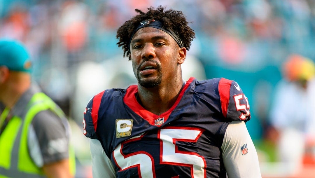 Houston Texans defensive lineman Jerry Hughes (55) walks off the field at half time during an NFL football game against the Miami Dolphins, Sunday, Nov. 27, 2022, in Miami Gardens, Fla. (AP Photo/Doug Murray)