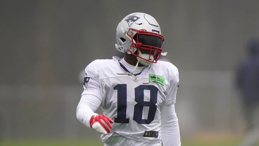 New England Patriots wide receiver Matthew Slater (18) warms up during an NFL football practice, Wednesday, Nov. 16, 2022, in Foxborough, Mass. (AP Photo/Steven Senne)