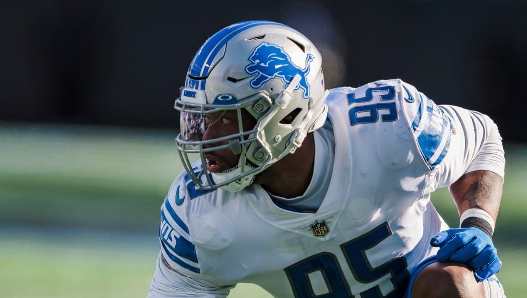 Detroit Lions linebacker Romeo Okwara (95) lines up during an NFL football game between the Carolina Panthers and the Detroit Lions on Saturday, Dec. 24, 2022, in Charlotte, N.C. (AP Photo/Jacob Kupferman)