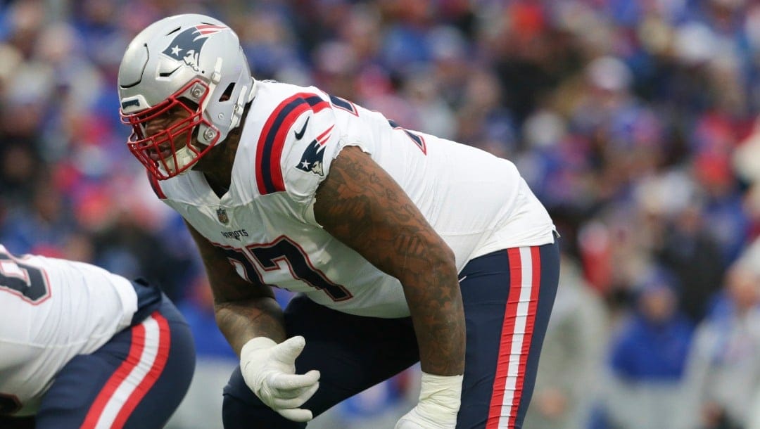 New England Patriots offensive tackle Trent Brown (77) lines up during the first half of an NFL football game against the Buffalo Bills on Sunday, Jan. 8, 2023, in Orchard Park, N.Y. (AP Photo/Joshua Bessex)