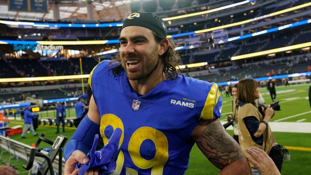 Los Angeles Rams tight end Tyler Higbee smiles has he leaves the field after their win in an NFL football game between the Los Angeles Rams and the Denver Broncos on Sunday, Dec. 25, 2022, in Inglewood, Calif. (AP Photo/Marcio J. Sanchez)