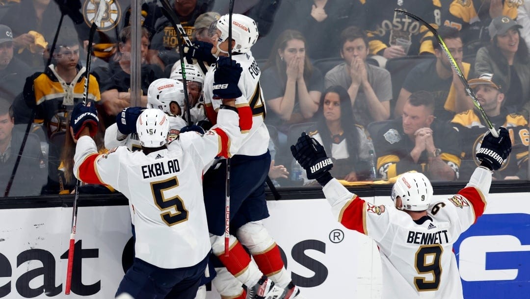 Florida Panthers' Carter Verhaeghe (23) celebrates after his goal in overtime during Game 7 of an NHL hockey Stanley Cup first-round playoff series against the Boston Bruins, Sunday, April 30, 2023, in Boston. (AP Photo/Michael Dwyer)