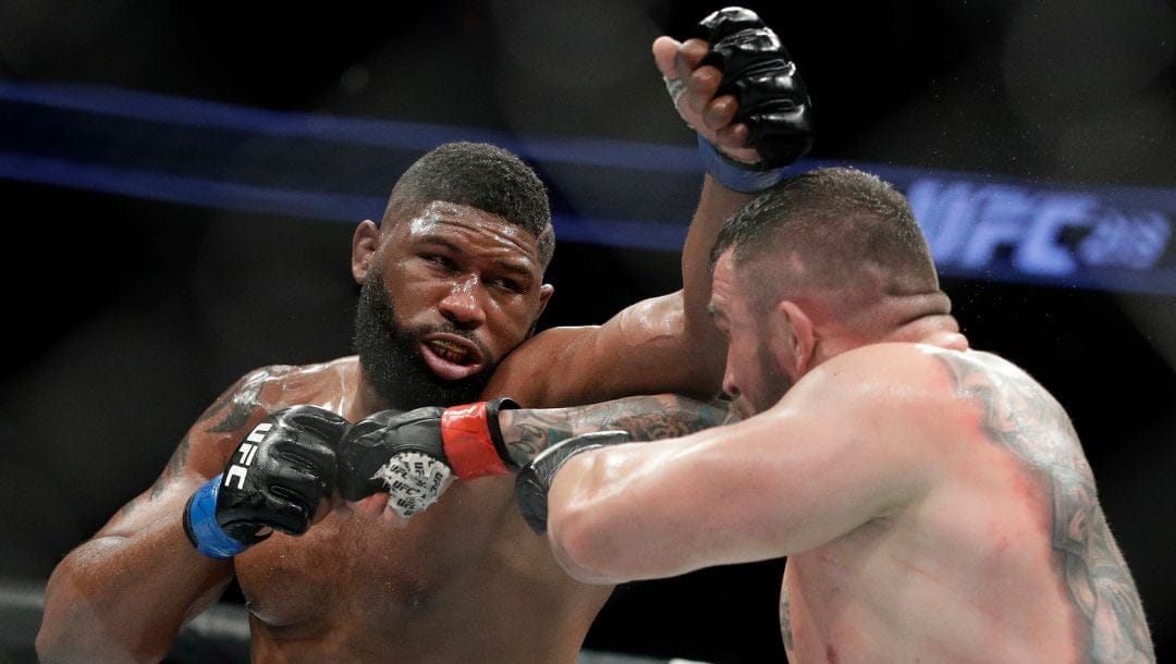 Daniel Omielanczuk, right, fights Curtis Blaydes in a heavyweight mixed martial arts bout at UFC 213, Saturday, July 8, 2017.