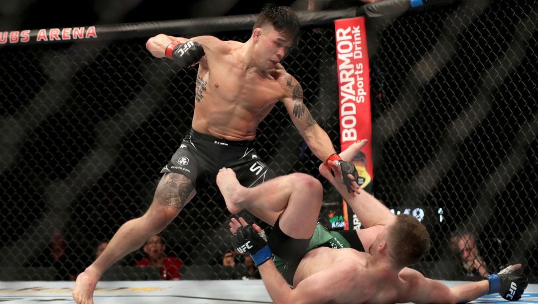 Ricky Simon, left, in action against Jack Shore during their mixed martial arts bout at UFC on ABC 3, Saturday, July 16, 2022.