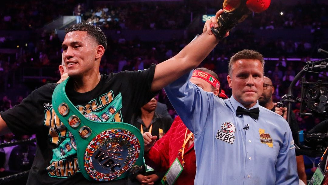 David Benavidez celebrates after defeating Anthony Dirrell during the WBC World Super Middleweight Championship boxing match.