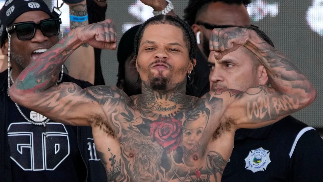 Gervonta Davis poses on the scale during a weigh-in Friday, April 21, 2023, in Las Vegas. Davis is scheduled to fight Ryan Garcia.