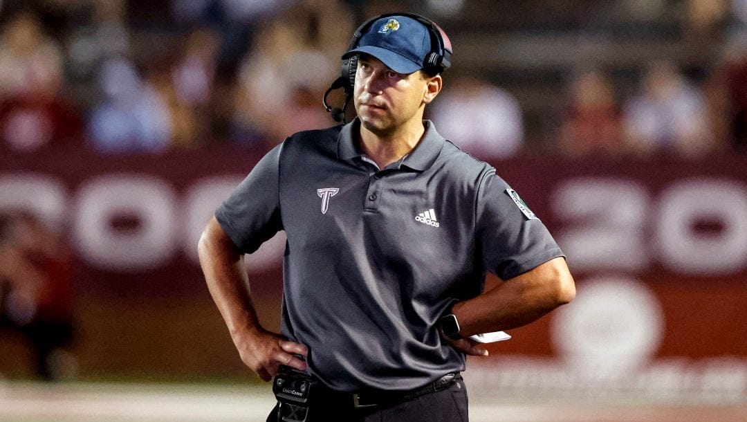 Troy head coach Jon Sumrall reacts after a play during the first half of an NCAA college football game against Marshall, Sept. 24, 2022, in Troy, Ala. Sumrall has agreed to a new four-year contract as Troy’s coach after leading the Trojans to a Sun Belt Conference championship and national ranking in his debut season.
