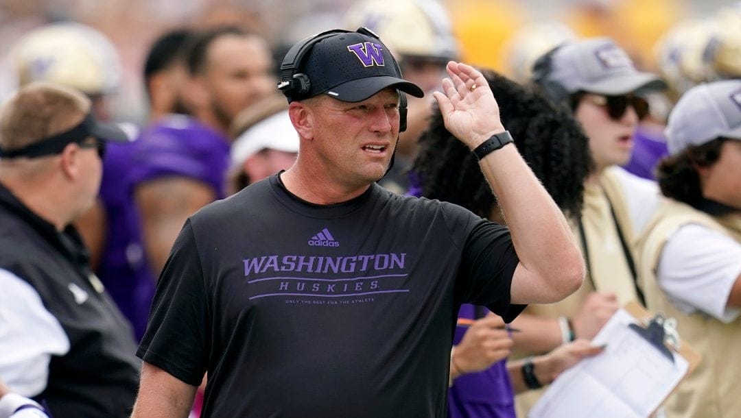 Washington head coach Kalen DeBoer paces the sideline during the first half of an NCAA college football game against Arizona State in Tempe, Ariz., Saturday, Oct. 8, 2022.