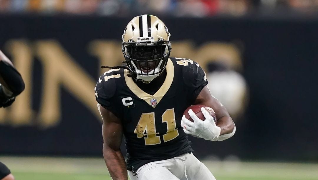 New Orleans Saints running back Alvin Kamara (41) carries in the first half of an NFL football game against the Carolina Panthers in New Orleans, Sunday, Jan. 8, 2023.