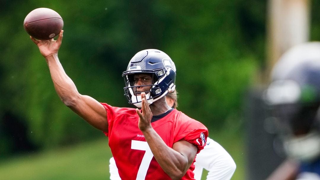 Seattle Seahawks quarterback Geno Smith throws during drills Monday, May 22, 2023, at the team's NFL football training facility in Renton, Wash.