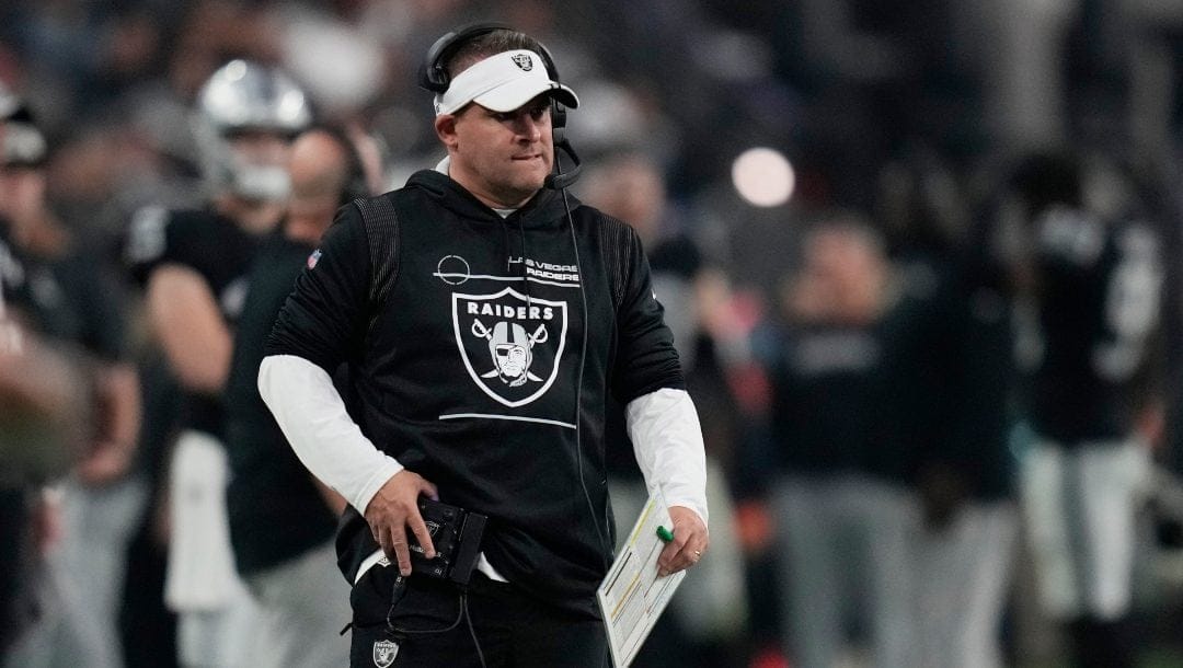 Las Vegas Raiders head coach Josh McDaniels stands on the sidelines during the second half of an NFL football game against the Kansas City Chiefs, Wednesday, Jan. 11, 2023, in Las Vegas.
