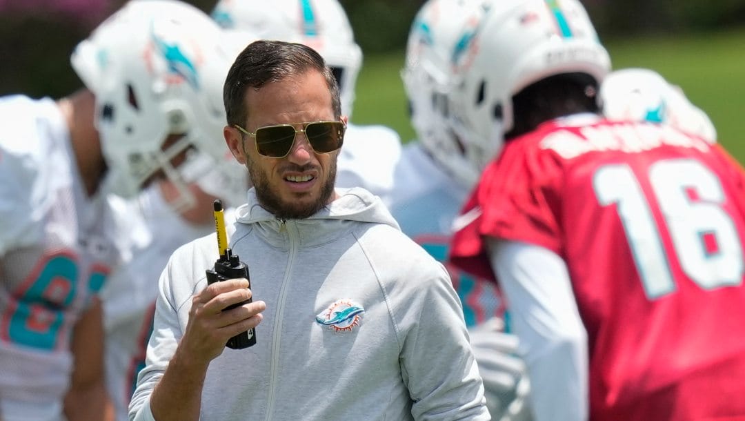 Miami Dolphins head coach Mike McDaniel watches as players participate in the the NFL football team's rookie minicamp in Miami Gardens, Fla., Friday, May 12, 2023.