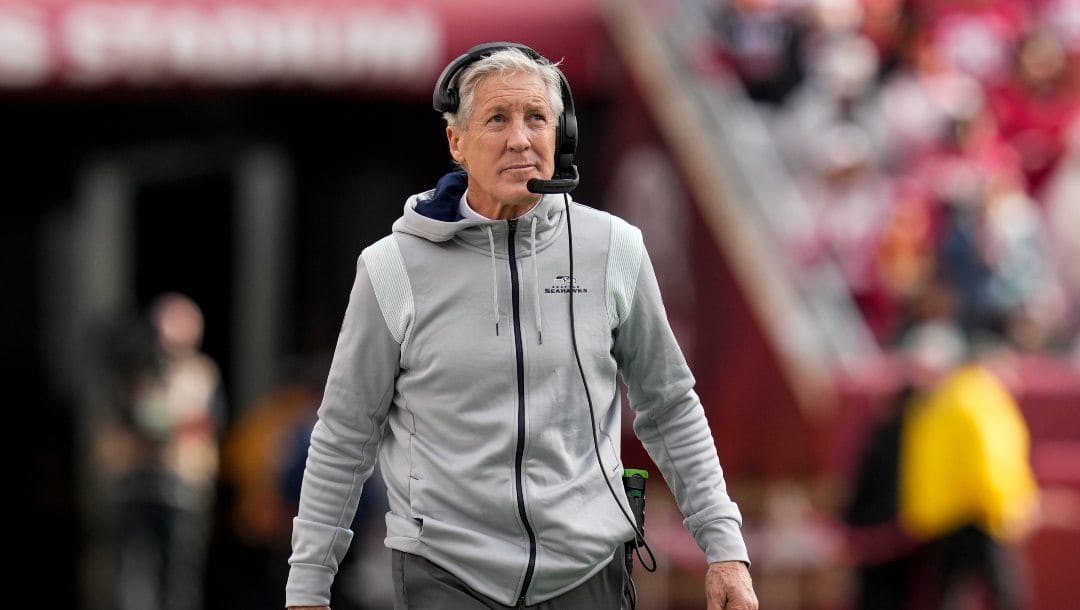 Seattle Seahawks head coach Pete Carroll watches from the sideline during the second half of an NFL wild card playoff football game against the San Francisco 49ers in Santa Clara, Calif., Saturday, Jan. 14, 2023.