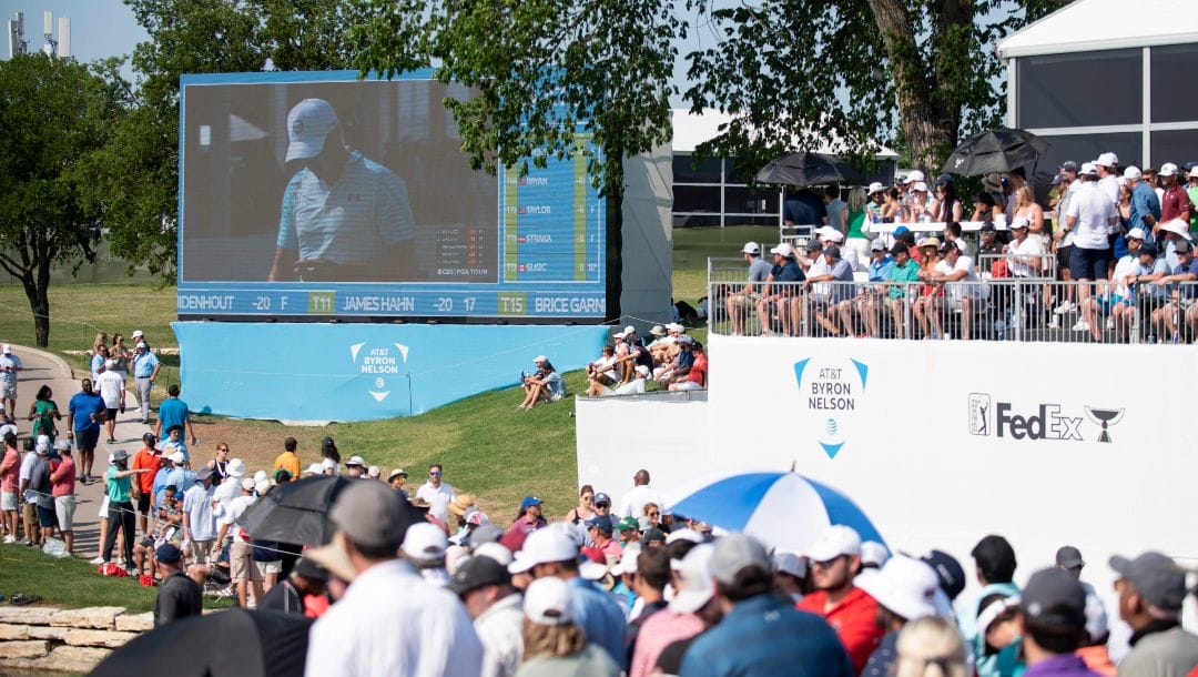 Fans watch Jordan Spieth golf on the 17th hole during the fourth round of the AT&T Byron Nelson golf tournament in McKinney, Texas, on Sunday, May 15, 2022.