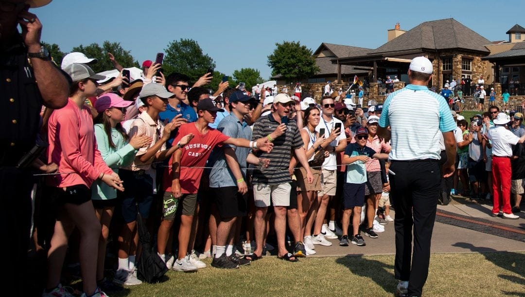 Jordan Spieth walks off of the golf course after finishing the fourth round of the AT&T Byron Nelson golf tournament in McKinney, Texas, on Sunday, May 15, 2022.