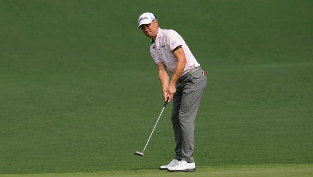 Justin Thomas putts on the second hole during the first round of the Masters golf tournament at Augusta National Golf Club on Thursday, April 6, 2023, in Augusta, Ga.