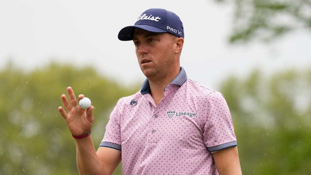 Justin Thomas waves after his putt on the fourth hole during the second round of the PGA Championship golf tournament at Oak Hill Country Club on Friday, May 19, 2023, in Pittsford, N.Y.