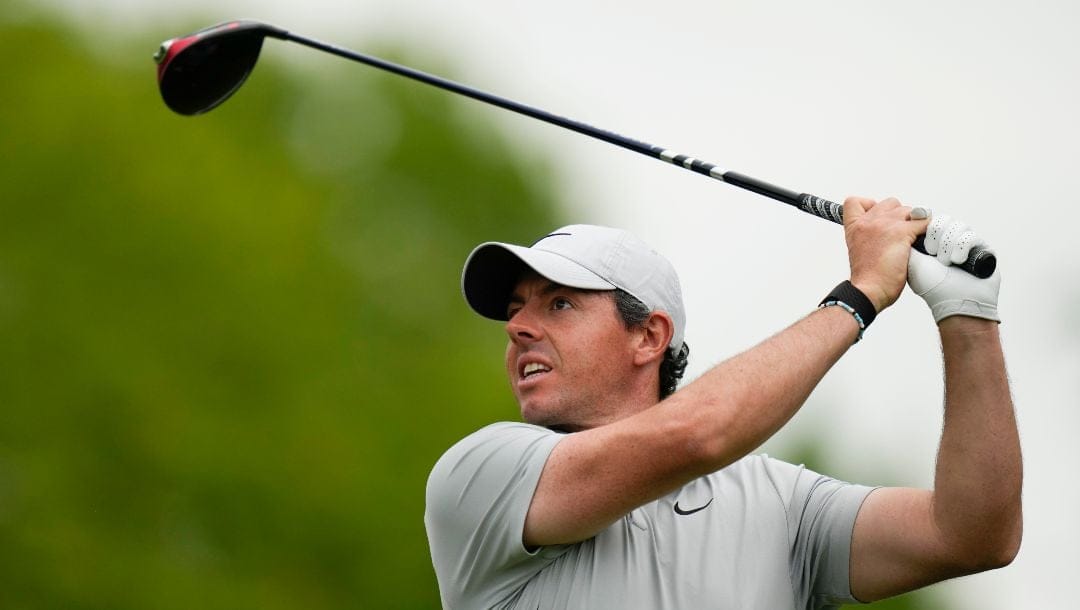 Rory McIlroy, of Northern Ireland, watches his tee shot on the fourth hole during the second round of the PGA Championship golf tournament at Oak Hill Country Club on Friday, May 19, 2023, in Pittsford, N.Y.