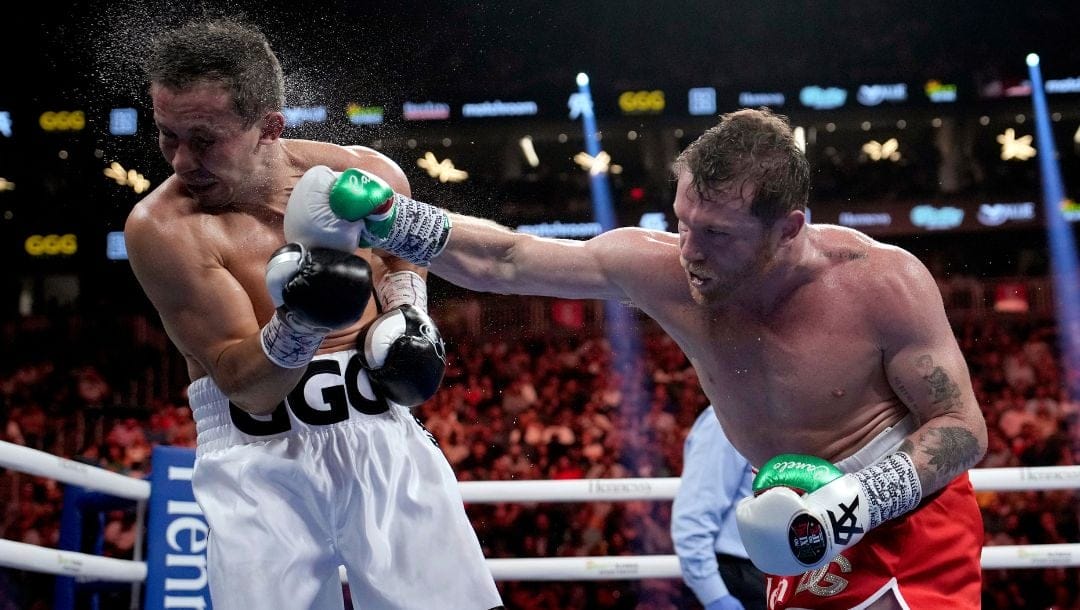 Canelo Alvarez, right, fights Gennady Golovkin in a super middleweight title boxing match, Saturday, Sept. 17, 2022.