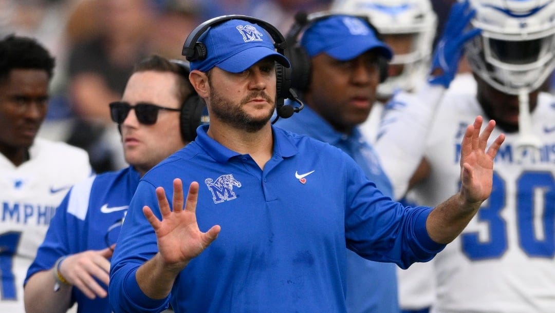 Memphis head coach Ryan Silverfield gestures during the second half of an NCAA college football game against Navy, Saturday, Sept. 10, 2022, in Annapolis, Md. (AP Photo/Nick Wass)