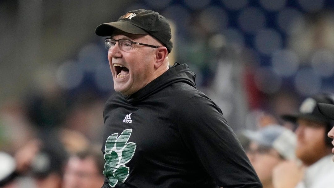 Ohio head coach Tim Albin yells from the sideline during the first half of the Mid-American Conference championship NCAA college football game against Toledo, Saturday, Dec. 3, 2022, in Detroit. (AP Photo/Carlos Osorio)