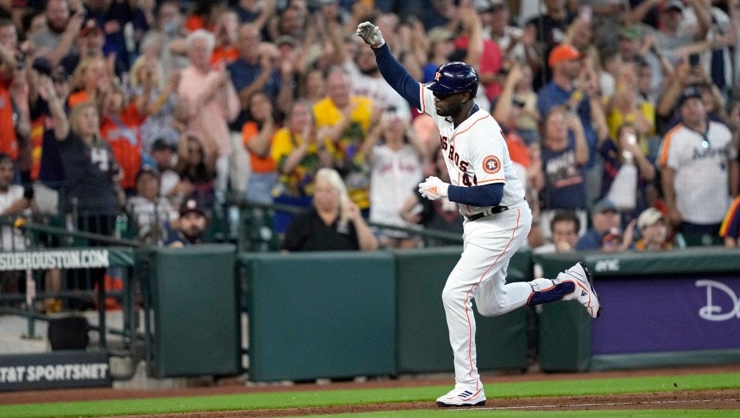 Houston Astros' Yordan Alvarez celebrates after hitting a home run against the Oakland Athletics during the eighth inning of a baseball game Saturday, May 20, 2023, in Houston.