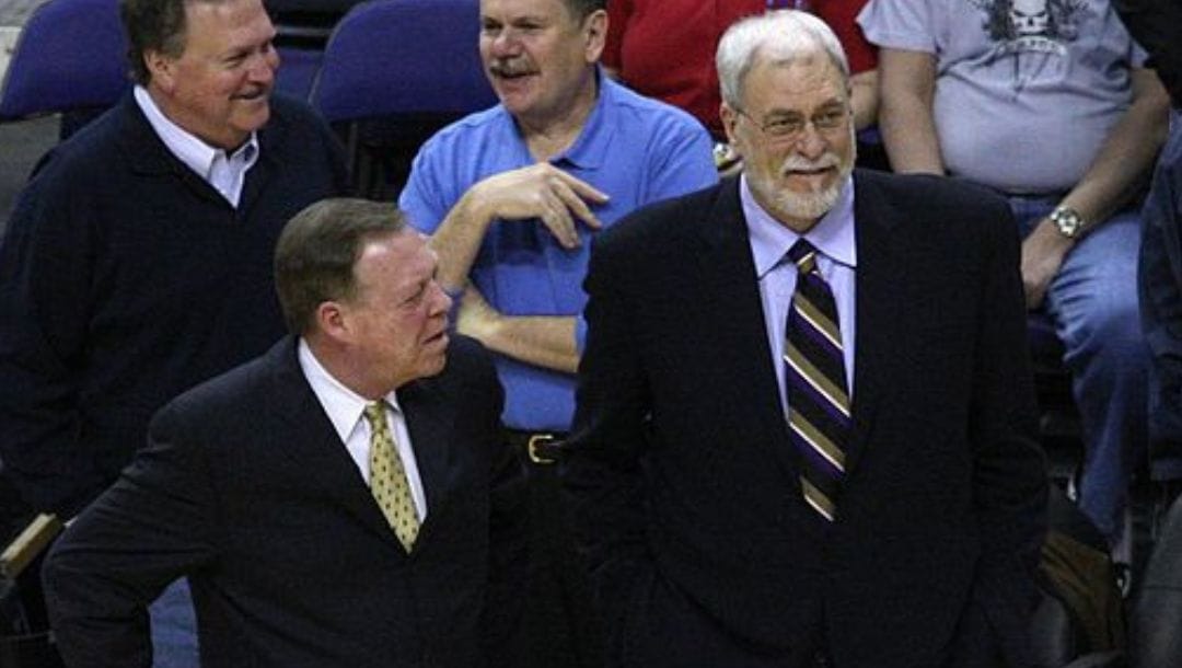 Los Angeles Lakers head coach Phil Jackson (right) talks with assistant coach Frank Hamblen during a game in February 2008.
