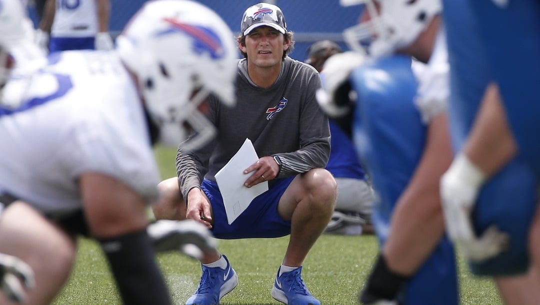Buffalo Bills offensive coordinator Ken Dorsey looks on during the NFL football team's mandatory minicamp in Orchard Park, N.Y., on June 15, 2022. Dorsey has the self-awareness to understand the gravity of the role of being a first-time coordinator and overseeing a high-powered Josh Allen-led Buffalo Bills offense.