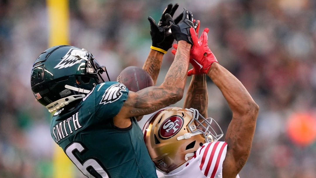 San Francisco 49ers cornerback Charvarius Ward, right, breaks up a pass intended for Philadelphia Eagles wide receiver DeVonta Smith during the first half of the NFC Championship NFL football game between the Philadelphia Eagles and the San Francisco 49ers on Sunday, Jan. 29, 2023, in Philadelphia. (AP Photo/Matt Slocum)