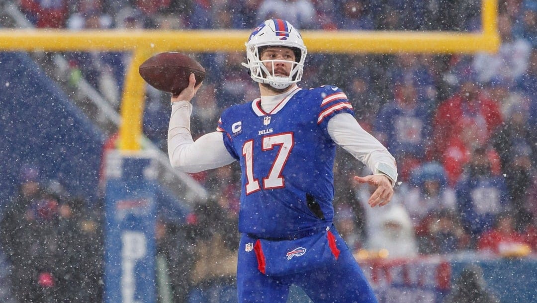 Buffalo Bills quarterback Josh Allen (17) throws a pass during an NFL divisional round playoff football game Sunday, Jan. 22, 2023, in Orchard Park, NY.
