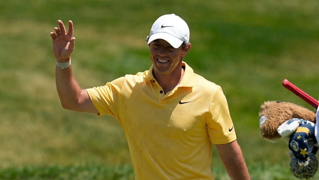 Rory McIlroy, of Northern Ireland, reacts after hitting on the fourth hole during the final round of the Memorial golf tournament, Sunday, June 4, 2023, in Dublin, Ohio. (AP Photo/Darron Cummings)