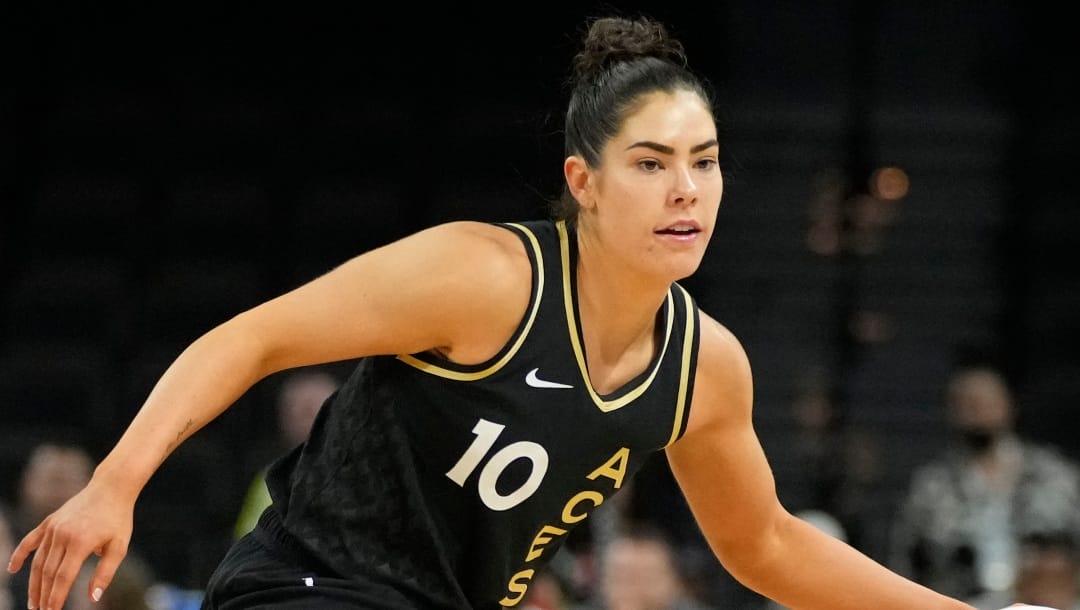 FILE - Las Vegas Aces' Kelsey Plum drives against the Dallas Wings during the second half of a WNBA basketball game June 5, 2022, in Las Vegas. Plum has been elected to serve as first vice president of the WNBA Players Association. It is her first term on the WNBPA Executive Committee. (AP Photo/John Locher, File)