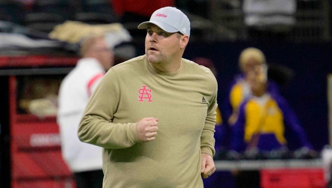 South Alabama head coach Kane Wommack runs before the New Orleans Bowl NCAA college football game against Western Kentucky in New Orleans, Wednesday, Dec. 21, 2022.