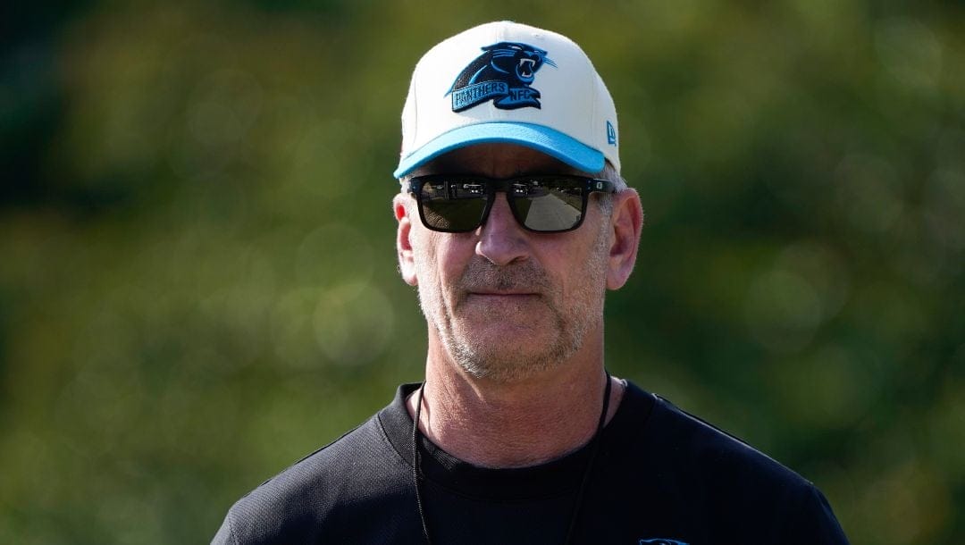 Carolina Panthers head coach Frank Reich walks to the field for NFL football practice, Thursday, June 1, 2023, in Charlotte, N.C.