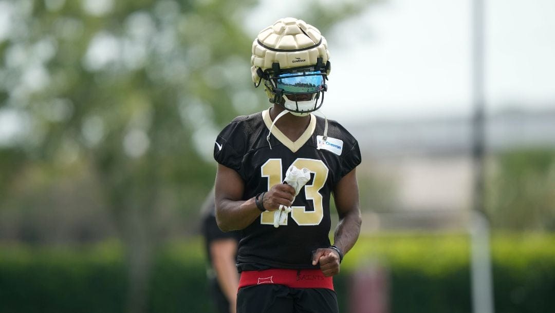 New Orleans Saints wide receiver Michael Thomas (13) watches drills at the team's NFL football minicamp in Metairie, La., Thursday, June 15, 2023.