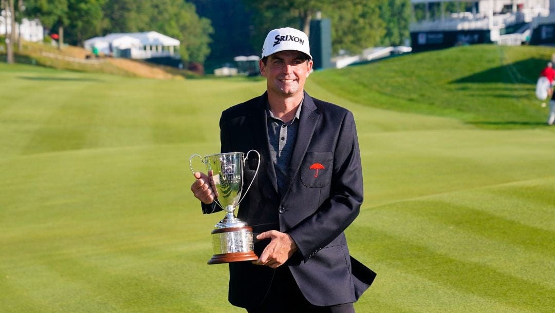 Keegan Bradley celebrates winning the Travelers Championship golf tournament at TPC River Highlands, Sunday, June 25, 2023, in Cromwell, Conn.