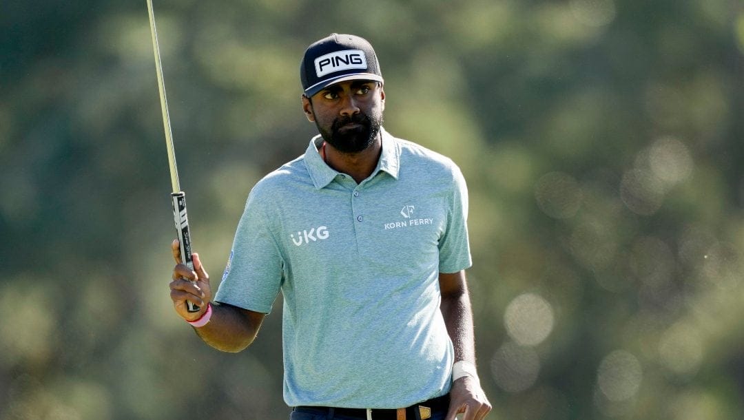Sahith Theegala waves after his putt on the 18th hole during the final round of the Masters golf tournament at Augusta National Golf Club on Sunday, April 9, 2023, in Augusta, Ga.