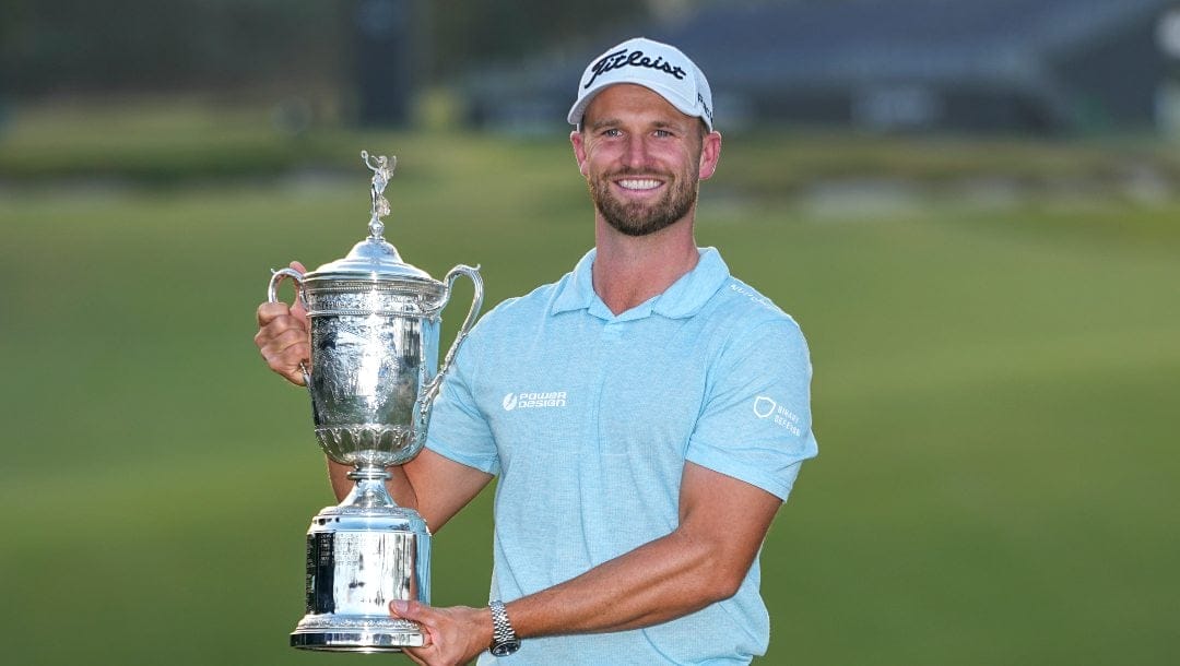 Wyndham Clark holds the trophy after winning after the U.S. Open golf tournament at Los Angeles Country Club on Sunday, June 18, 2023, in Los Angeles.