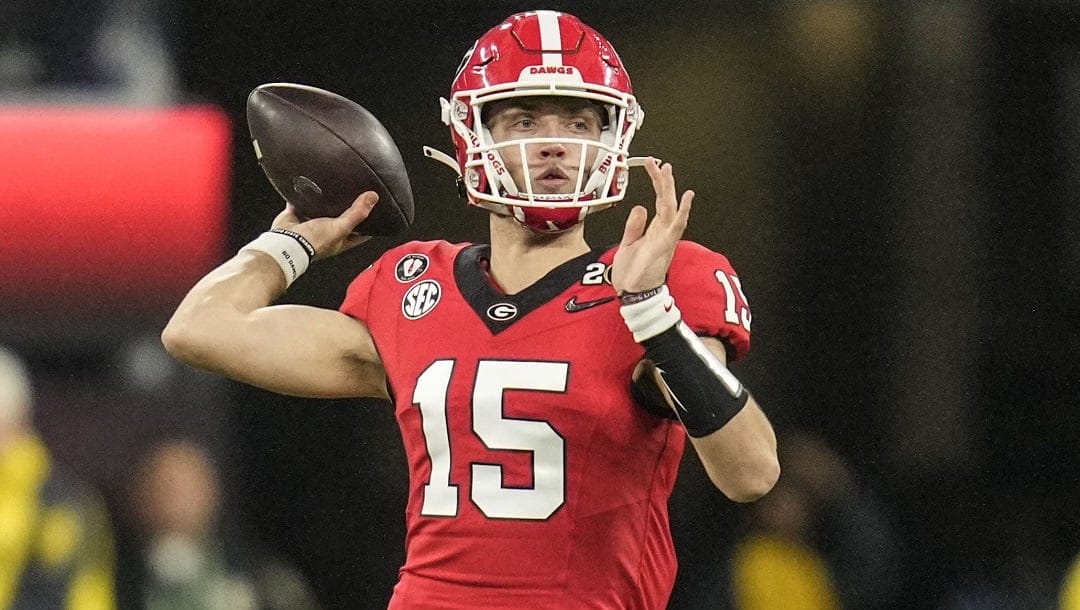 Georgia quarterback Carson Beck (15) passes in the pocket against TCU during the second half of the national championship NCAA College Football Playoff game, Monday, Jan. 9, 2023, in Inglewood, Calif.