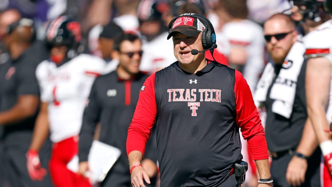 Texas Tech head coach Joey McGuire looks on during the first half of an NCAA college football game against TCU, Saturday, Nov. 5, 2022, in Fort Worth, Texas. TCU won 34-24. (AP Photo/Ron Jenkins)