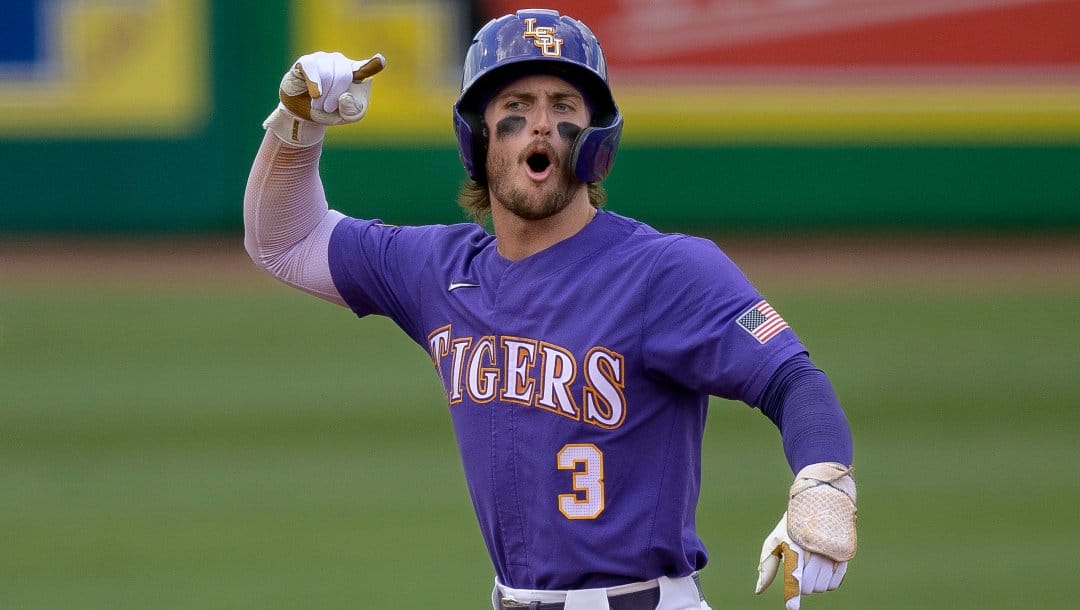 LSU outfielder Dylan Crews (3) celebrates a double and run batted in during an NCAA baseball game against Tulane on Friday, June 2, 2023, in Baton Rouge, La.