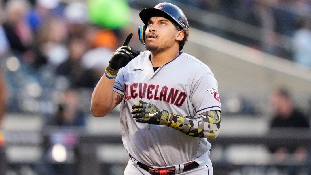 Cleveland Guardians' Josh Naylor gestures as he runs the bases after hitting a three-run home run during the first inning of a baseball game against the New York Mets Friday, May 19, 2023, in New York.