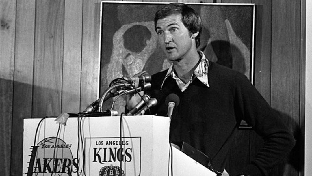 Basketball player Jerry West holding press conference announcing his retirement in Los Angeles.